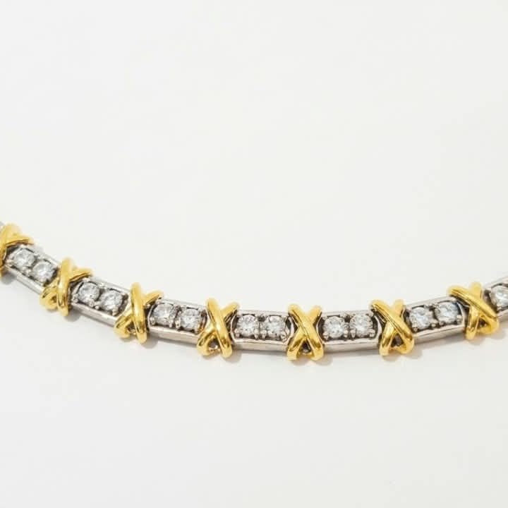 Tiffany 16 Stone necklace featuring brilliant-cut stones and a signature X-inspired setting, 45 cm length