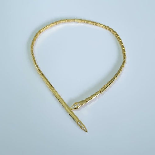 Bulgari Serpenti gold-plated choker necklace with cubic zirconia snake head and tail detail, on white background
