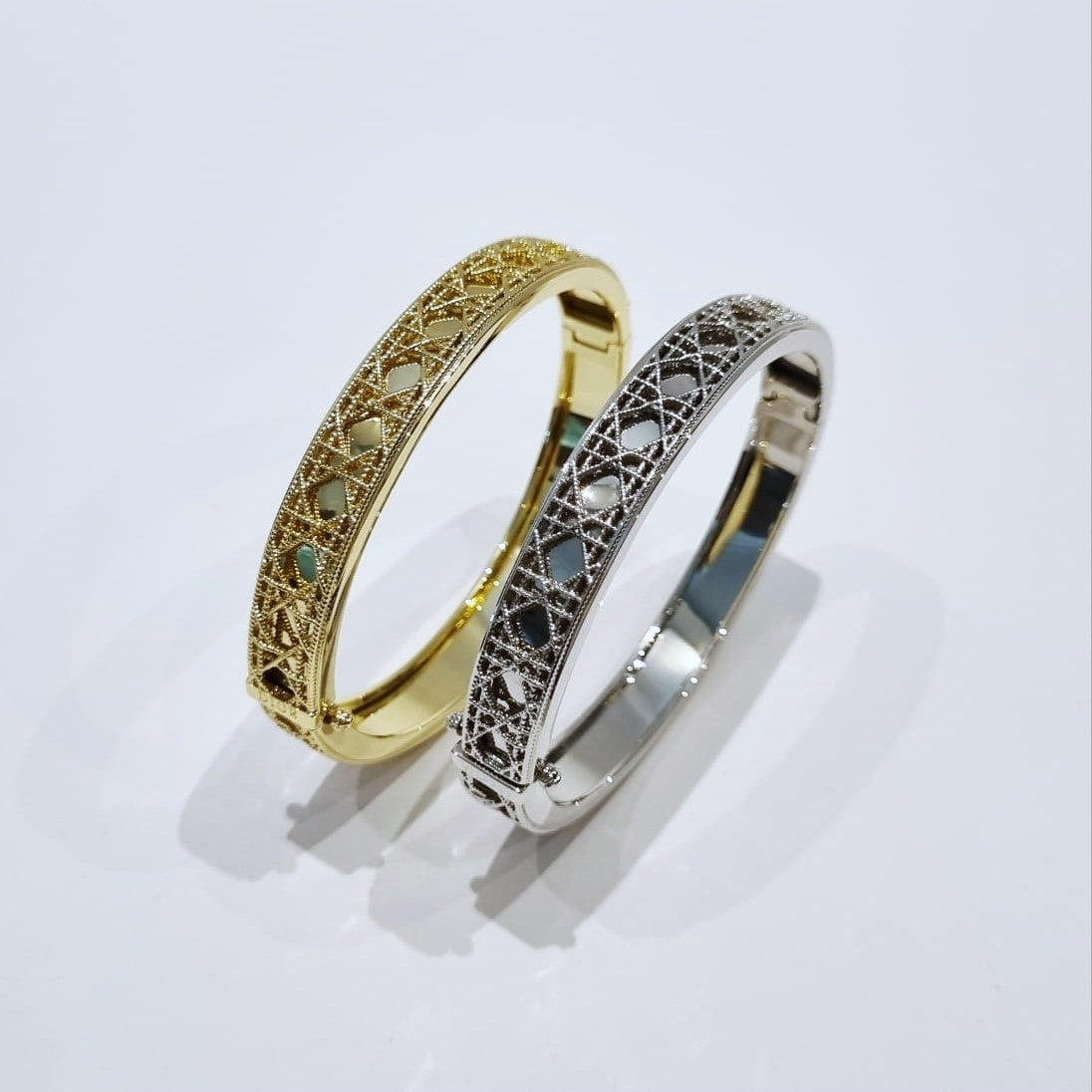 My Dior Bangle - gold-plated and silver-plated filigree bangles, both color variants
