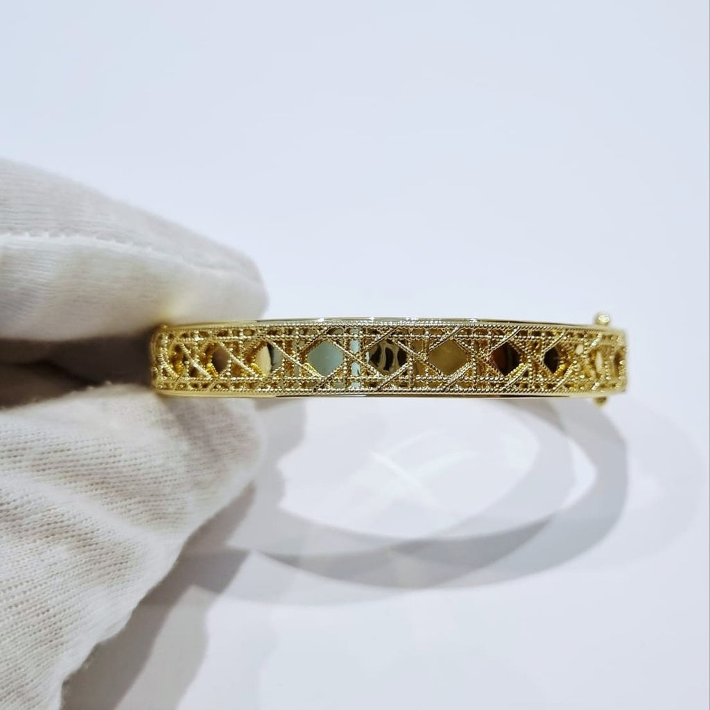 My Dior Bangle - gold-plated filigree bangle with colorful cannage detail, close-up view