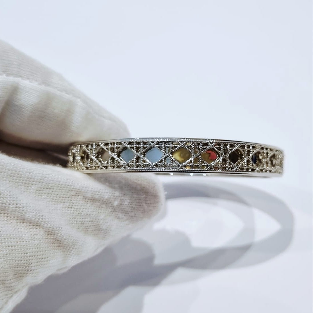 My Dior Bangle - silver-plated filigree bangle with colorful cannage detail, close-up view