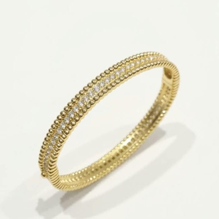 Van Cleef Perlee Bangle - 1 row of Zircon