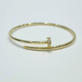 Cartier Clou Slim Bangle in gold – close-up