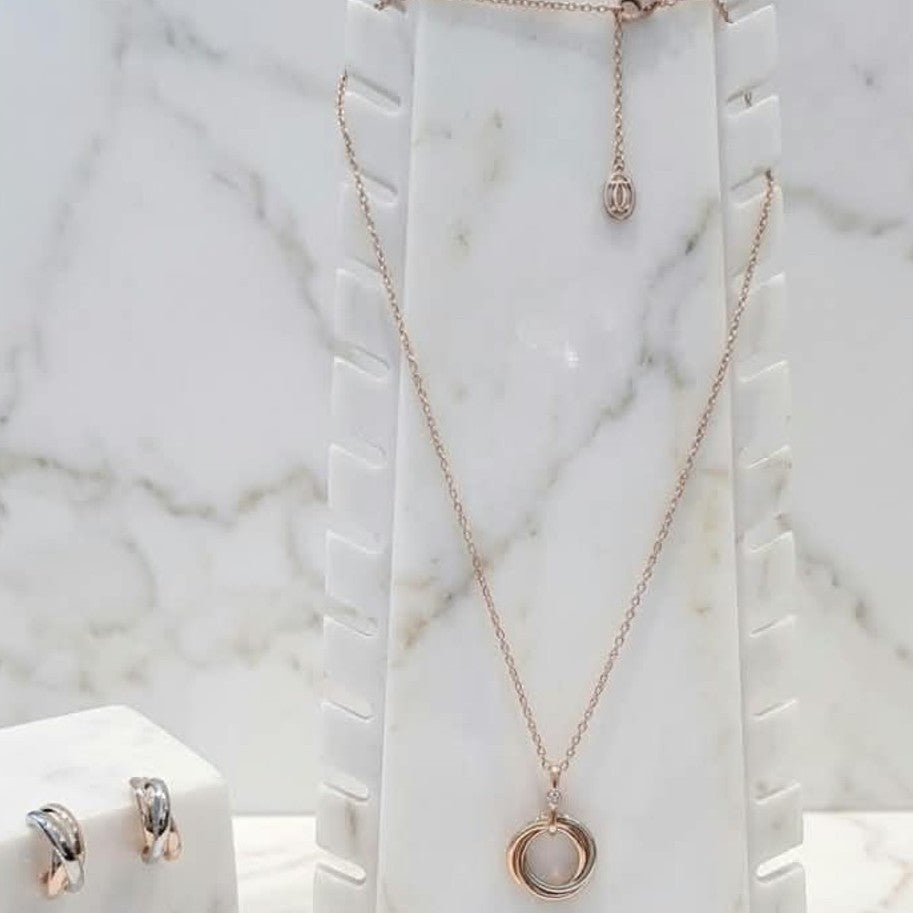 Cartier Trinity Pendant close-up detail – rose gold plated chain and pendant