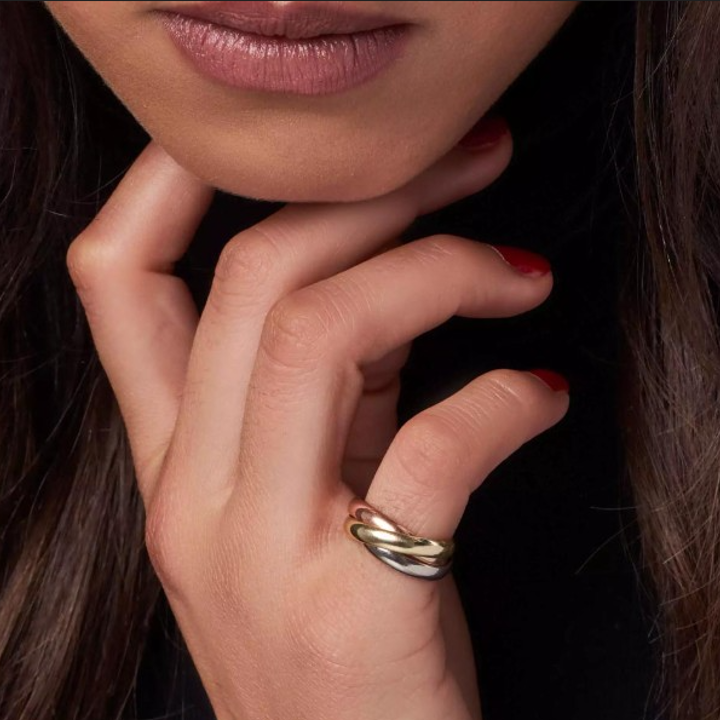 Cartier Trinity Ring worn on hand – three-tone gold plated everyday ring