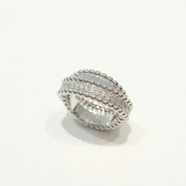 Van Cleef Perlee Twisted Ring - 1 row of Zircon