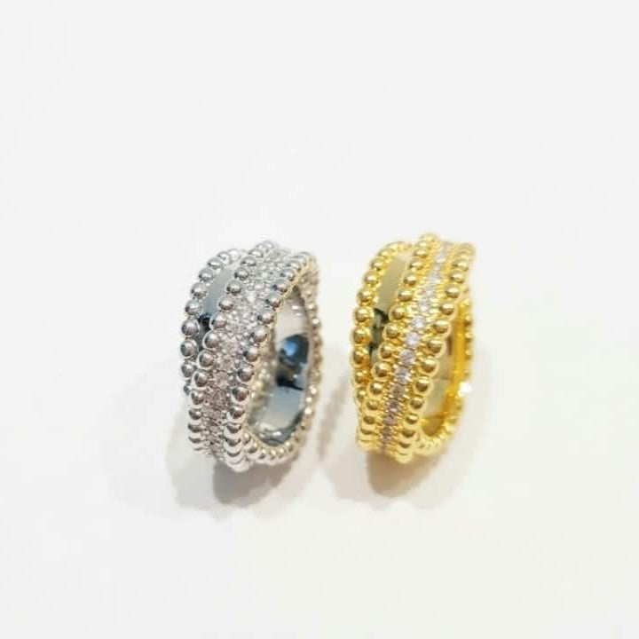 Van Cleef Perlee Twisted Ring - 1 row of Zircon